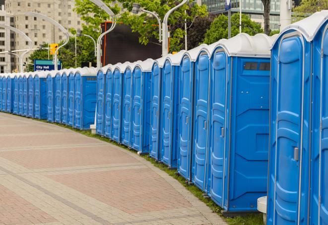 hygienic portable restrooms lined up at a beach party, ensuring guests have access to the necessary facilities while enjoying the sun and sand in Albertson NY